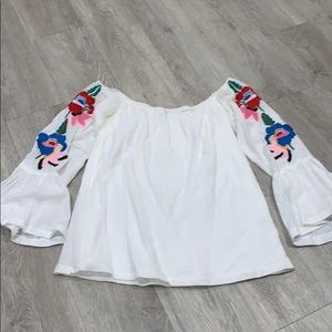 White off the shoulder top with flower details